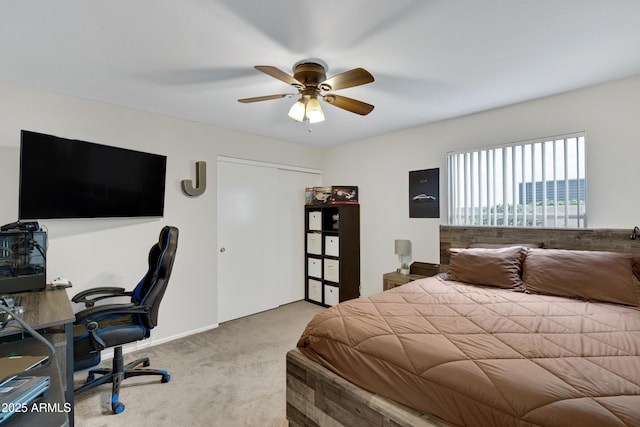 4329 W Electra Ln, Glendale, AZ 85310 - bedroom with carpet floors, an office area, a closet, and a ceiling fan