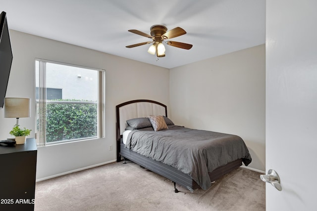 4329 W Electra Ln, Glendale, AZ 85310 - carpeted bedroom with multiple windows, baseboards, and ceiling fan