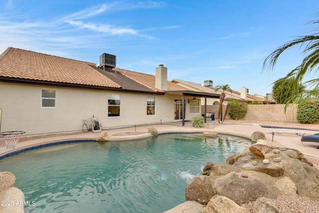 4329 W Electra Ln, Glendale, AZ 85310 - view of swimming pool with central air condition unit, ceiling fan, and a patio area