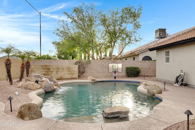 4329 W Electra Ln, Glendale, AZ 85310 - view of pool featuring a fenced backyard and central AC unit