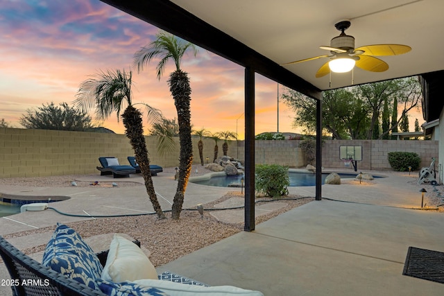 4329 W Electra Ln, Glendale, AZ 85310 - fenced backyard featuring ceiling fan and a patio