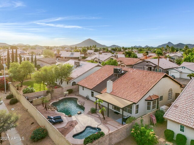 4329 W Electra Ln, Glendale, AZ 85310 - aerial view of residential area featuring a pool area and mountains
