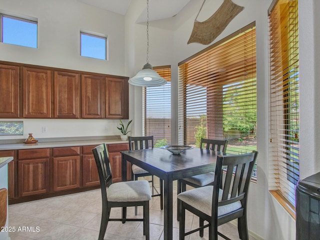 40814 N Majesty Ct, Anthem, AZ 85086 - dining room featuring a towering ceiling and light tile patterned floors