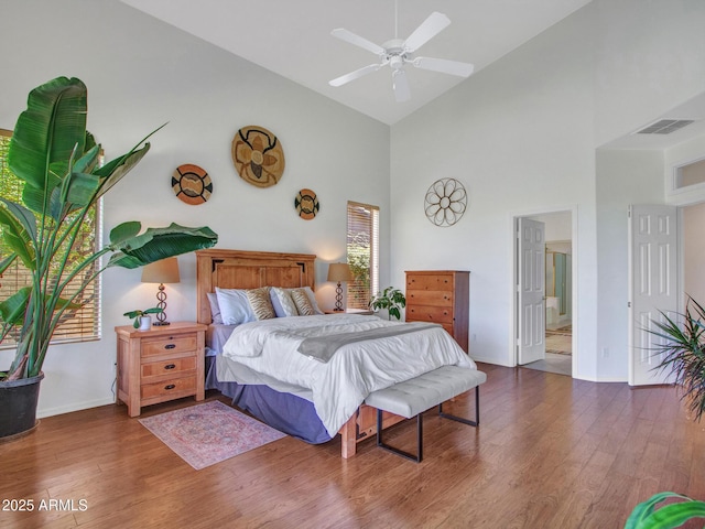 40814 N Majesty Ct, Anthem, AZ 85086 - bedroom featuring high vaulted ceiling, wood finished floors, and ceiling fan
