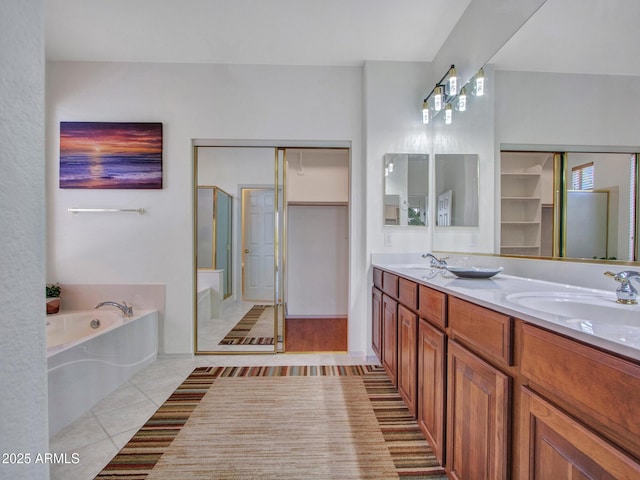 40814 N Majesty Ct, Anthem, AZ 85086 - full bath featuring tile patterned flooring, a garden tub, a stall shower, and double vanity