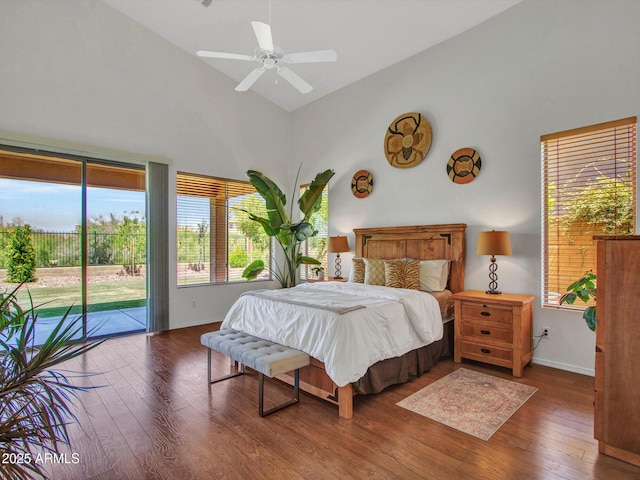 40814 N Majesty Ct, Anthem, AZ 85086 - bedroom with high vaulted ceiling, access to outside, wood finished floors, and ceiling fan