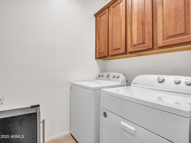 40814 N Majesty Ct, Anthem, AZ 85086 - laundry room with separate washer and dryer, cabinet space, and light tile patterned floors
