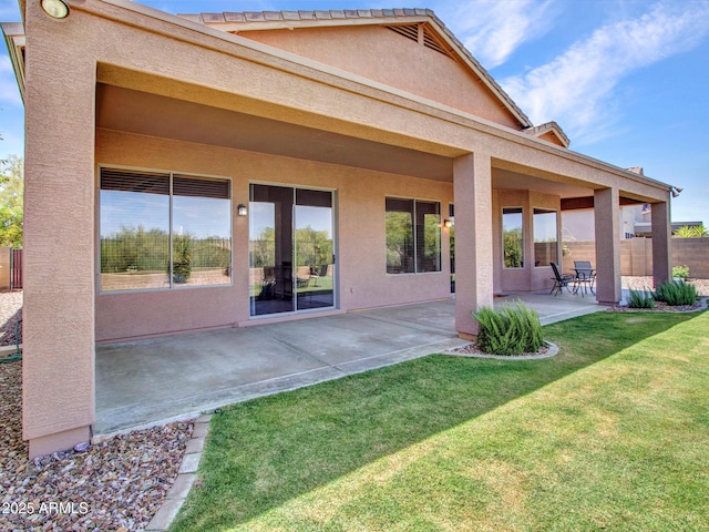 40814 N Majesty Ct, Anthem, AZ 85086 - back of property with stucco siding and a patio area