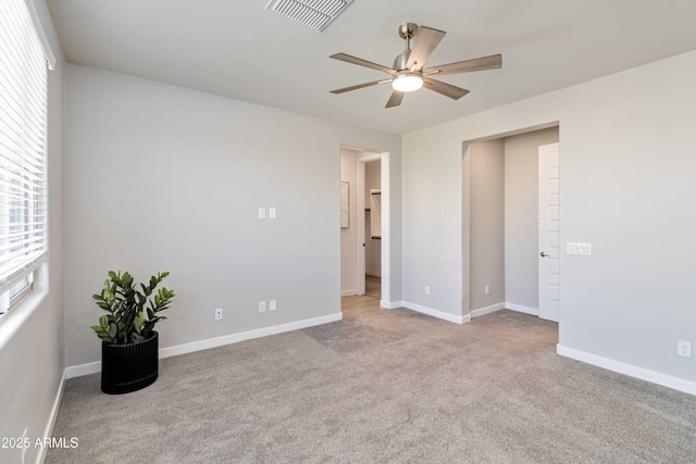 19958 W Turney Ave, Litchfield Park, AZ 85340 - unfurnished bedroom with visible vents, baseboards, and carpet flooring