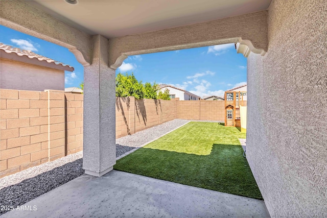 19958 W Turney Ave, Litchfield Park, AZ 85340 - view of yard featuring a fenced backyard, a playground, and a patio
