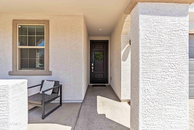 19958 W Turney Ave, Litchfield Park, AZ 85340 - doorway to property featuring stucco siding