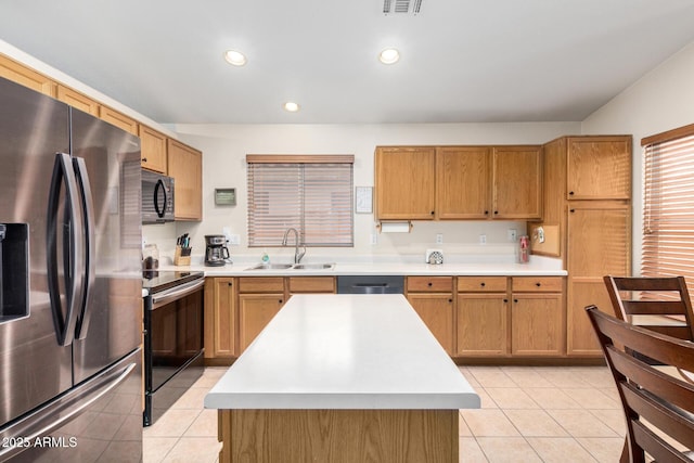 kitchen with a sink, light tile patterned flooring, electric stove, and stainless steel fridge with ice dispenser