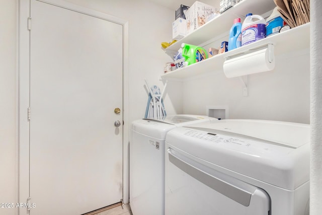 washroom with laundry area and washer and clothes dryer