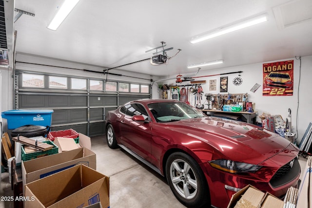 garage featuring a garage door opener