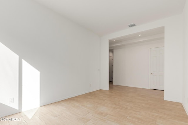 unfurnished room featuring light hardwood / wood-style flooring