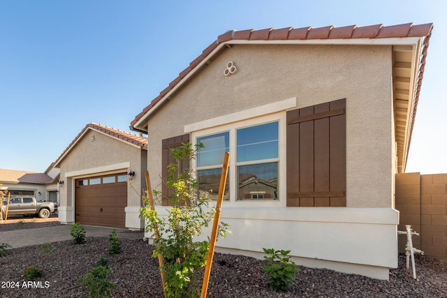 view of front of property with a garage