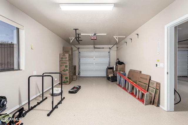 garage featuring a garage door opener