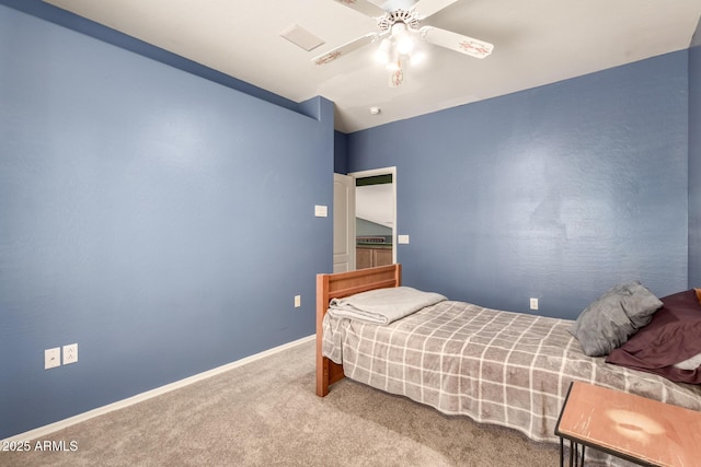 bedroom with carpet floors, a ceiling fan, and baseboards