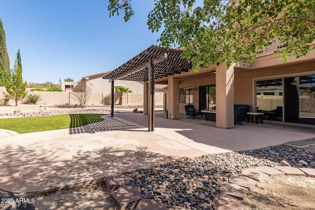 view of patio / terrace featuring fence