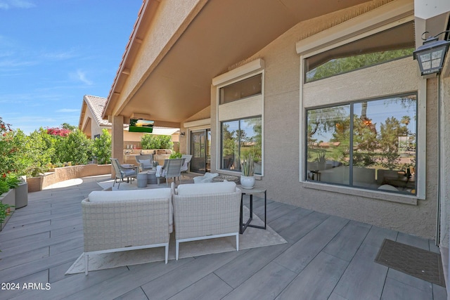 view of patio / terrace featuring an outdoor hangout area and a deck