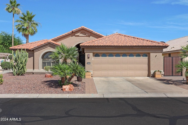 view of front of home with a garage