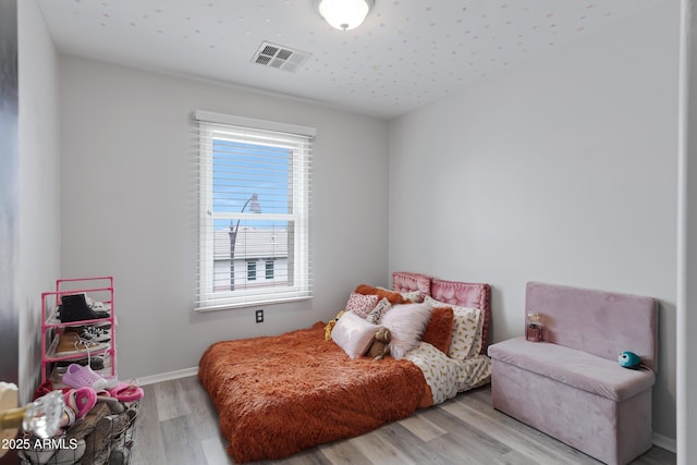 3687 E Leslie Dr, Gilbert, AZ 85296 - bedroom with light wood-type flooring and baseboards
