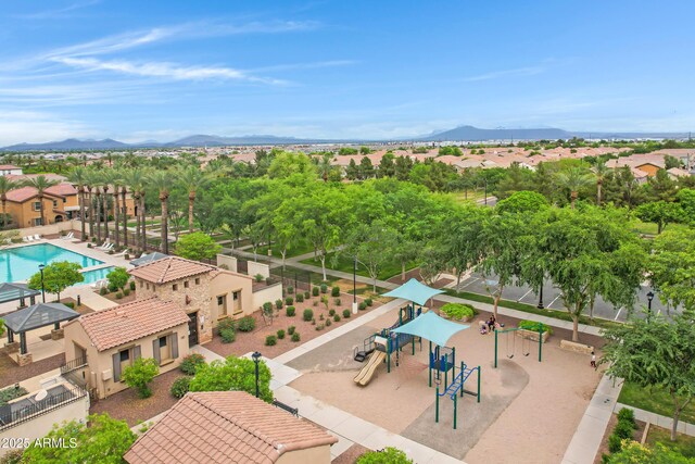 3687 E Leslie Dr, Gilbert, AZ 85296 - aerial view of residential area featuring a mountain backdrop and a pool