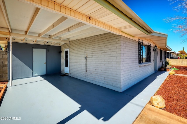 view of patio / terrace featuring a carport