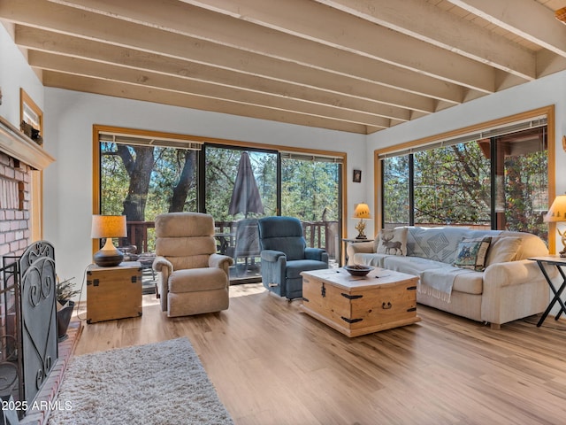 4567 N Juniper Ln, Pine, AZ 85544 - living room featuring beam ceiling and wood finished floors