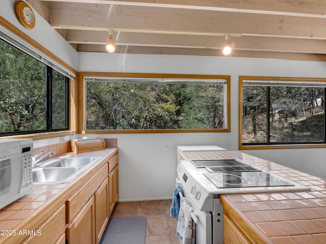 4567 N Juniper Ln, Pine, AZ 85544 - washroom featuring track lighting, a sink, light tile patterned flooring, and baseboards