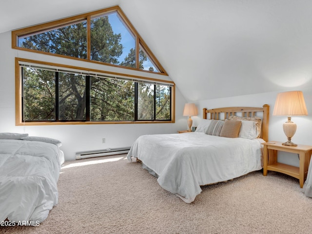 4567 N Juniper Ln, Pine, AZ 85544 - bedroom with a baseboard heating unit, vaulted ceiling, and carpet floors