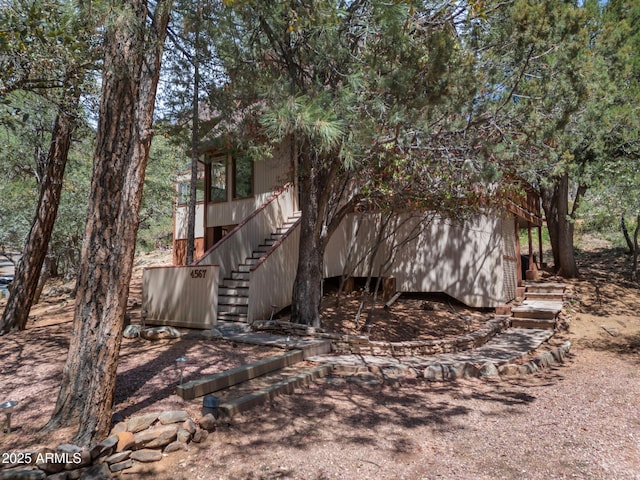 4567 N Juniper Ln, Pine, AZ 85544 - view of home's exterior featuring stairs