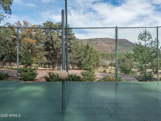 4567 N Juniper Ln, Pine, AZ 85544 - view of tennis court featuring a mountain view