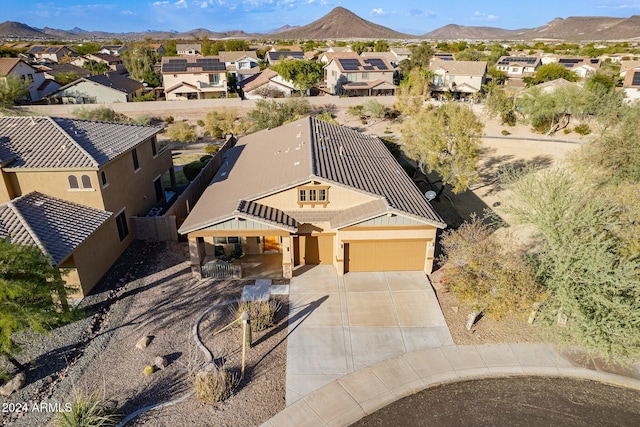 drone / aerial view featuring a mountain view