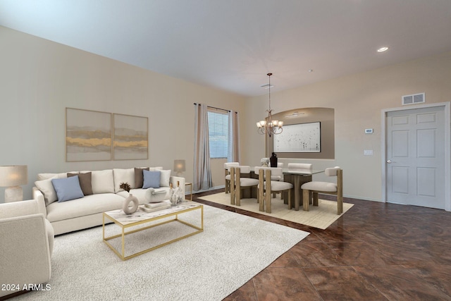 tiled living room featuring a chandelier