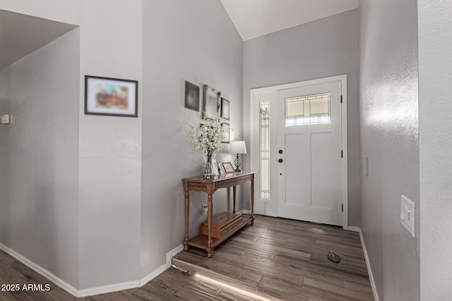 19 W Wickieup Ln, Phoenix, AZ 85027 - foyer entrance with wood finished floors, baseboards, and vaulted ceiling