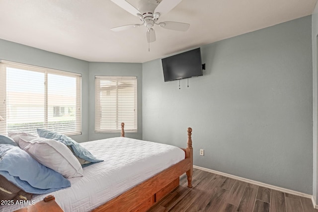 19 W Wickieup Ln, Phoenix, AZ 85027 - bedroom featuring dark wood-style flooring, baseboards, and ceiling fan