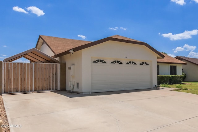 19 W Wickieup Ln, Phoenix, AZ 85027 - single story home featuring an attached garage, stucco siding, concrete driveway, and roof with shingles