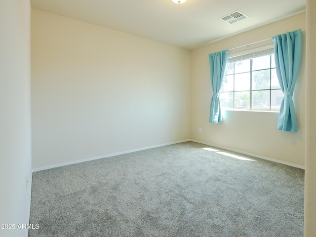 2826 E Tracy Ln Unit 3, Phoenix, AZ 85032 - unfurnished room with carpet flooring and baseboards