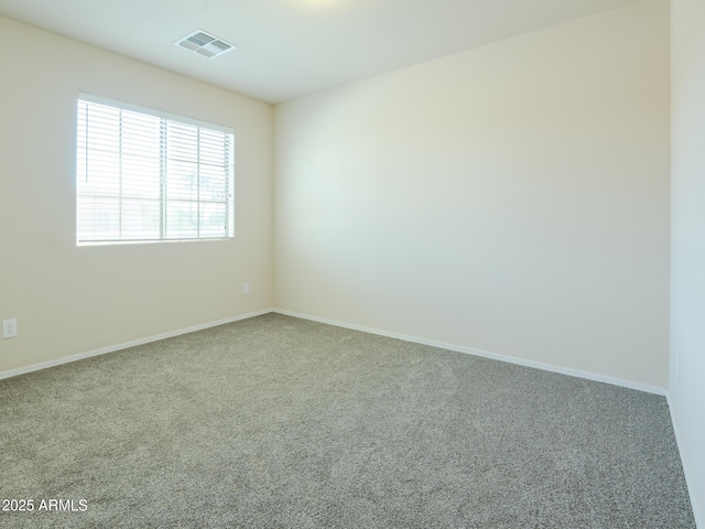 2826 E Tracy Ln Unit 3, Phoenix, AZ 85032 - empty room featuring carpet flooring and baseboards