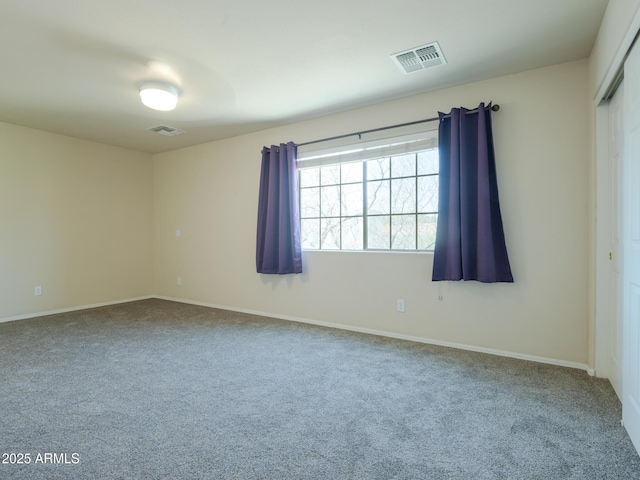 2826 E Tracy Ln Unit 3, Phoenix, AZ 85032 - carpeted spare room with baseboards