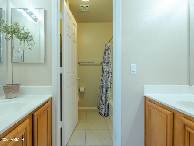 2826 E Tracy Ln Unit 3, Phoenix, AZ 85032 - bathroom featuring two vanities, tile patterned floors, and shower / bath combination with curtain