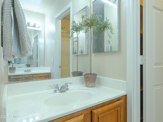 2826 E Tracy Ln Unit 3, Phoenix, AZ 85032 - bathroom featuring vanity and a shower