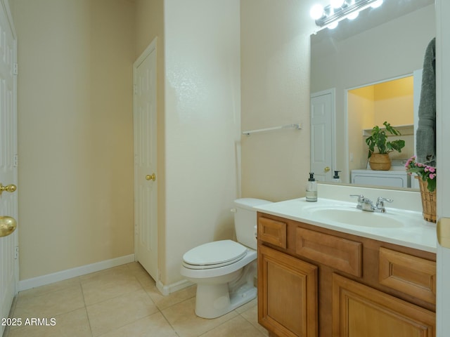 2826 E Tracy Ln Unit 3, Phoenix, AZ 85032 - bathroom with toilet, tile patterned floors, vanity, and baseboards