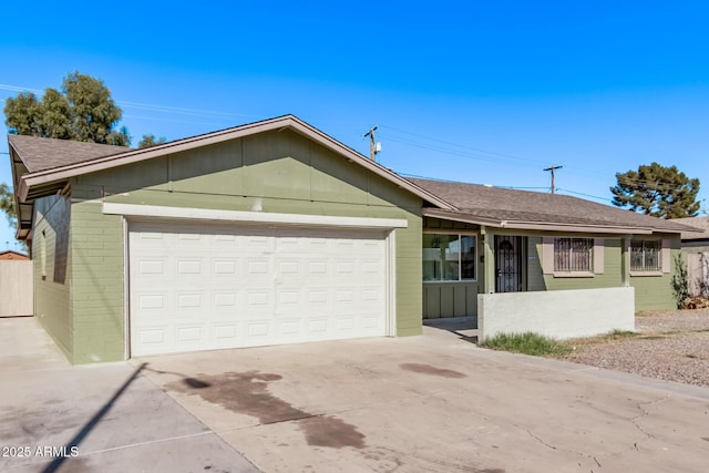 ranch-style home featuring a garage