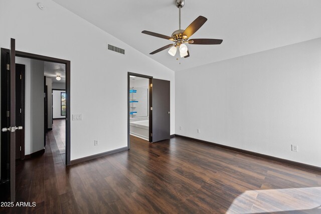 unfurnished bedroom with wood finished floors, baseboards, a ceiling fan, and high vaulted ceiling
