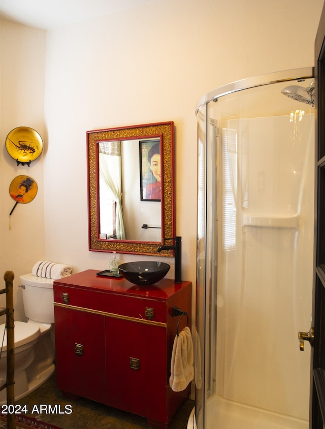 601 N Berry Ave, Winslow, AZ 86047 - bathroom with a shower with door, vanity, and toilet