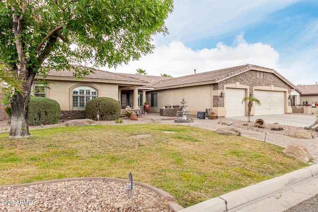 ranch-style home with a garage, stone siding, concrete driveway, and stucco siding