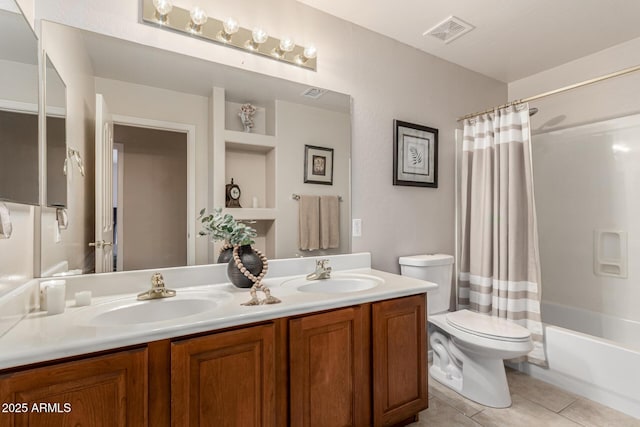 full bath featuring toilet, tile patterned flooring, visible vents, and a sink