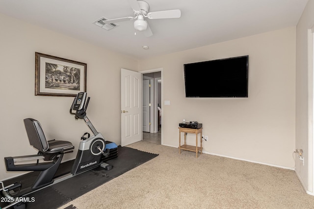 workout room featuring visible vents, ceiling fan, and baseboards